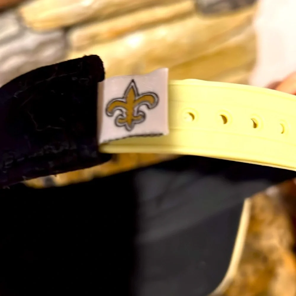 NFL Store. Saints Fleur De Lis Black and Gold. NWOT Visor. Adjustable.